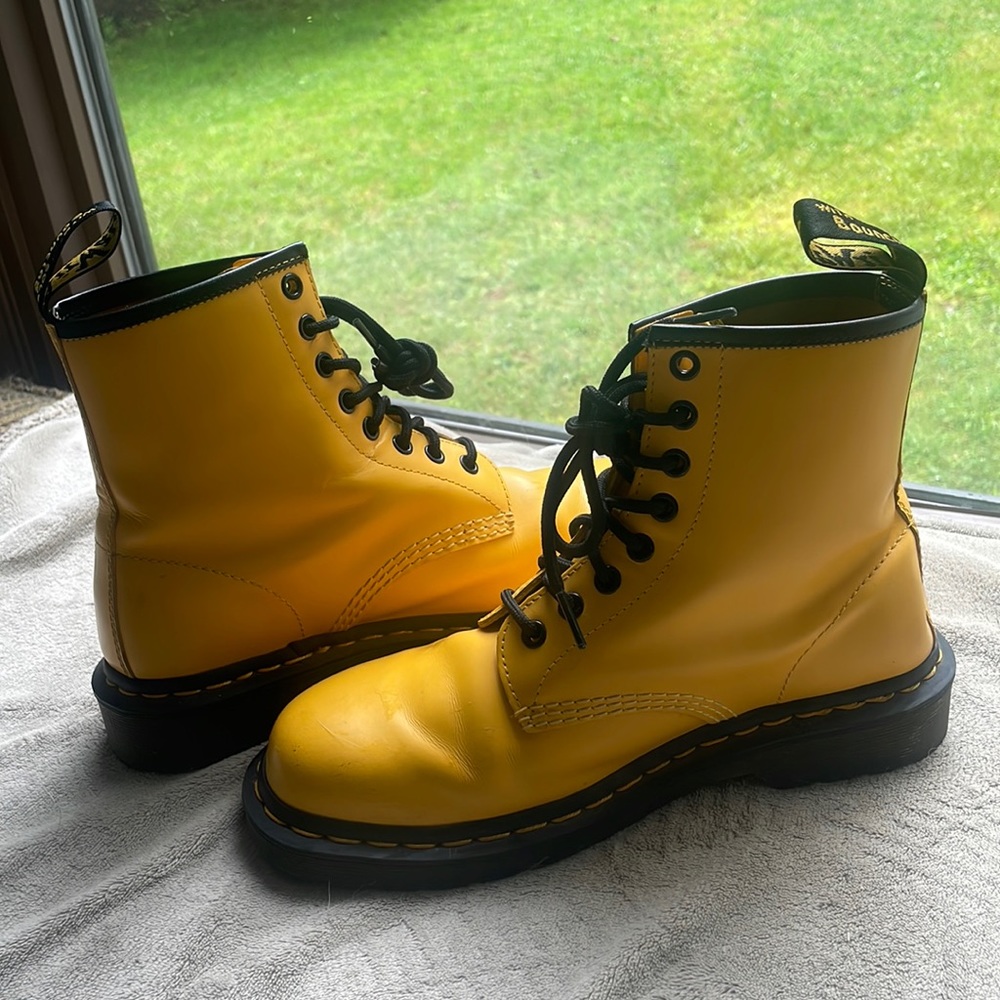 I am selling my Mr. Martens , size 8 combat boots. They are slightly used.